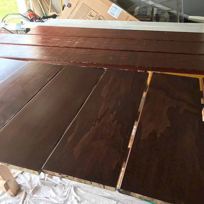 Hardwood flooring installed on a stair landing by Sparrow Contracting
