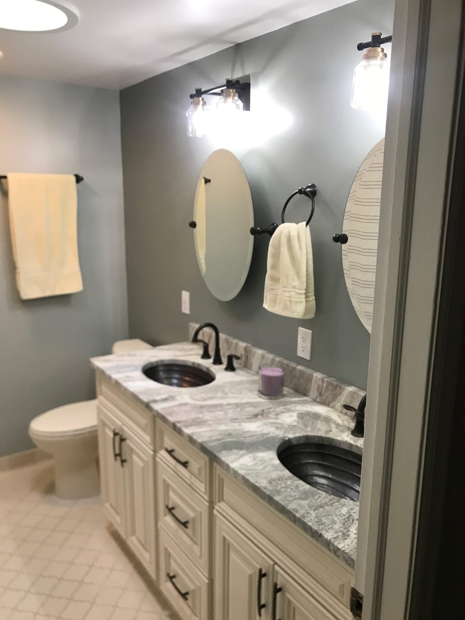 Double vanity bathroom remodel with granite countertops